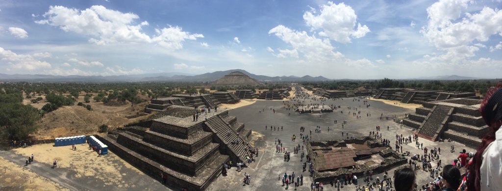 Tourist roam about the pyramids at Teotihuacan.