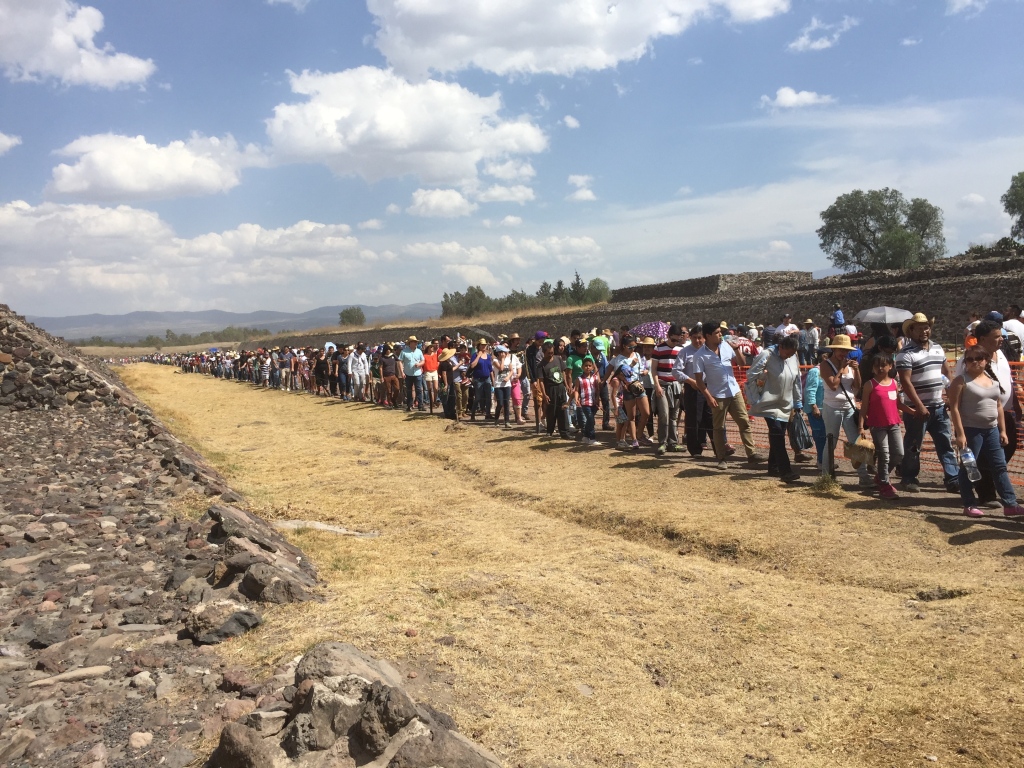 Tourists wait in line to climb the pyramid of the sun in teotihuacan.
