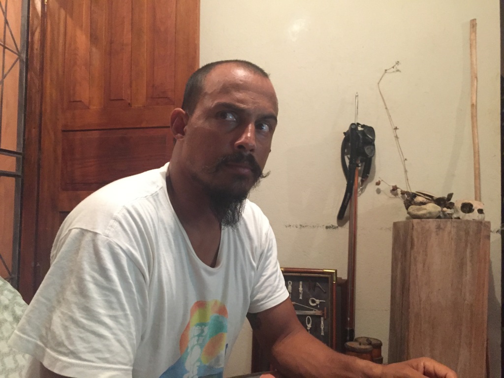 Fabian Sanchez sits on a couch at his house in Tamarindo.