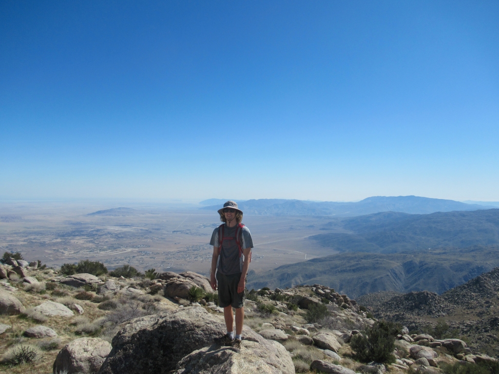 Evan Quarnstrom standing atop San Ysidro Mountain east.