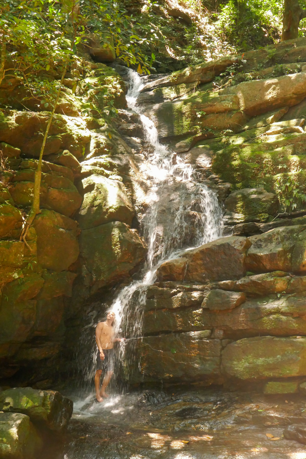 Bathing in a waterfall on the trail to Pedra da Gavea.